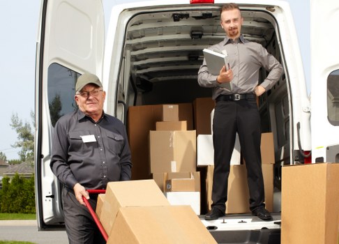 Removal van outside a Fulham residential street with moving crew preparing for a house move