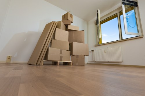 Local moving team handling boxes and furniture in Fulham