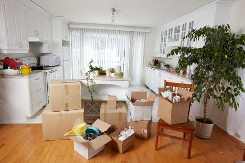 Specialist movers preparing a grand piano for safe transport in Fulham