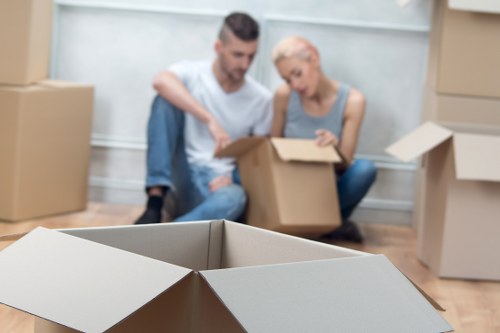 A man and van loading furniture for a Fulham flat move