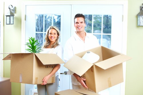 Removal van loading boxes from a flat in Fulham