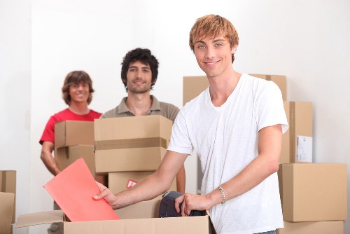A local packing team preparing boxes in a Fulham property