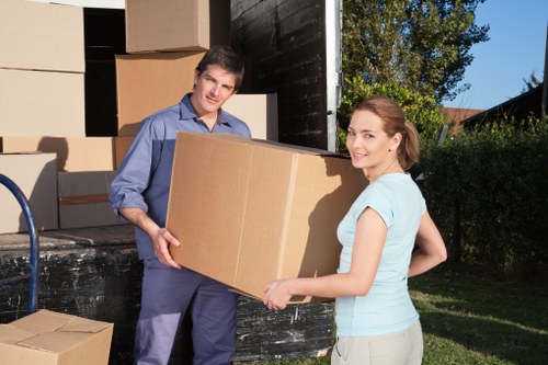 Furniture and boxes being loaded for a Fulham home move